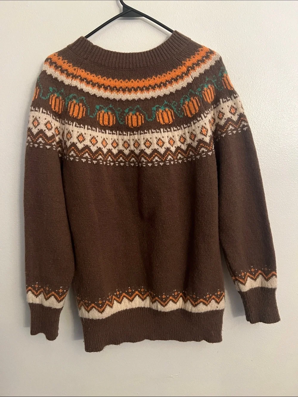 Woman’s comfy pumpkin sweater